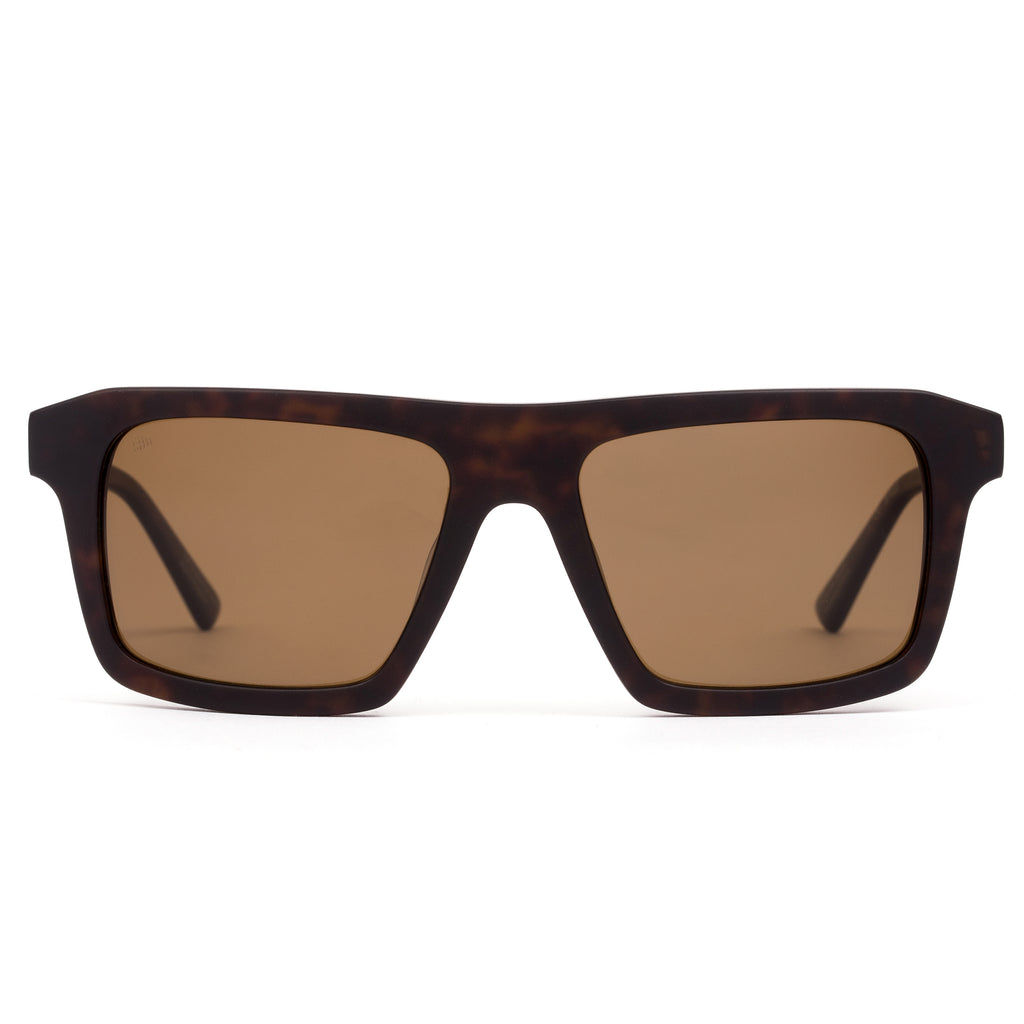 Sunglasses with tortoiseshell frame and brown lenses on a white background