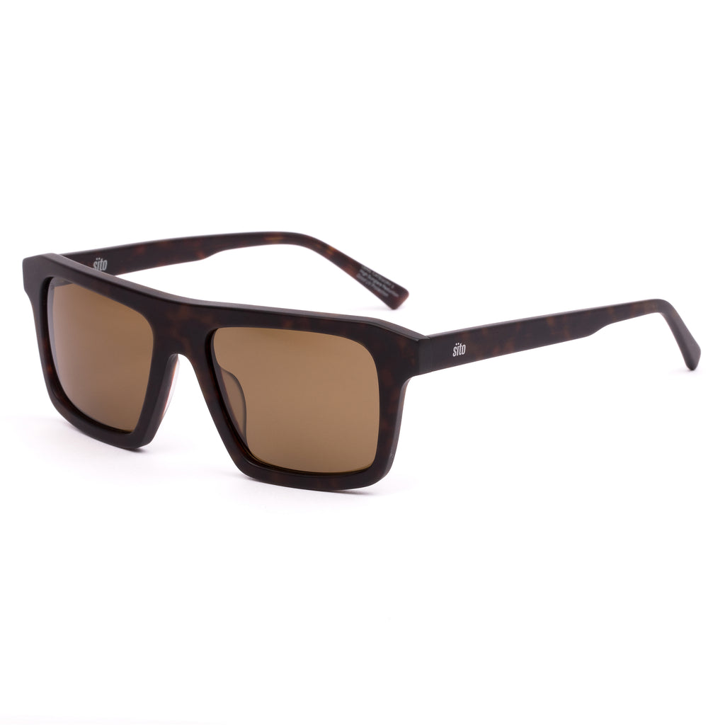 Sunglasses with tortoiseshell frame and brown lenses on a white background