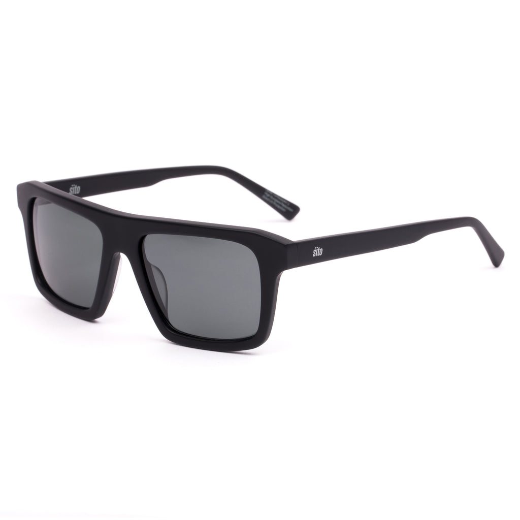 Black sunglasses with dark lenses on a white background