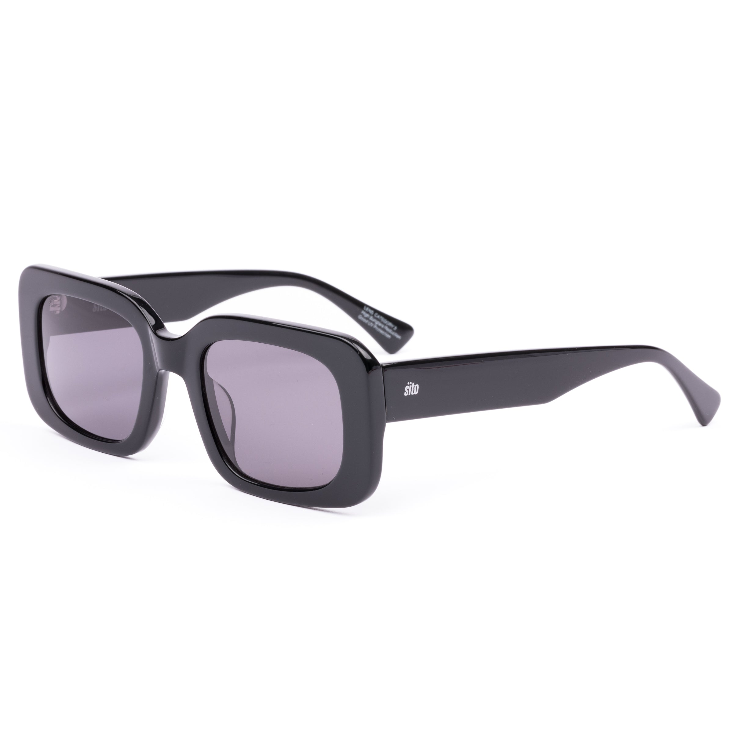 Black sunglasses with gray lenses on a white background