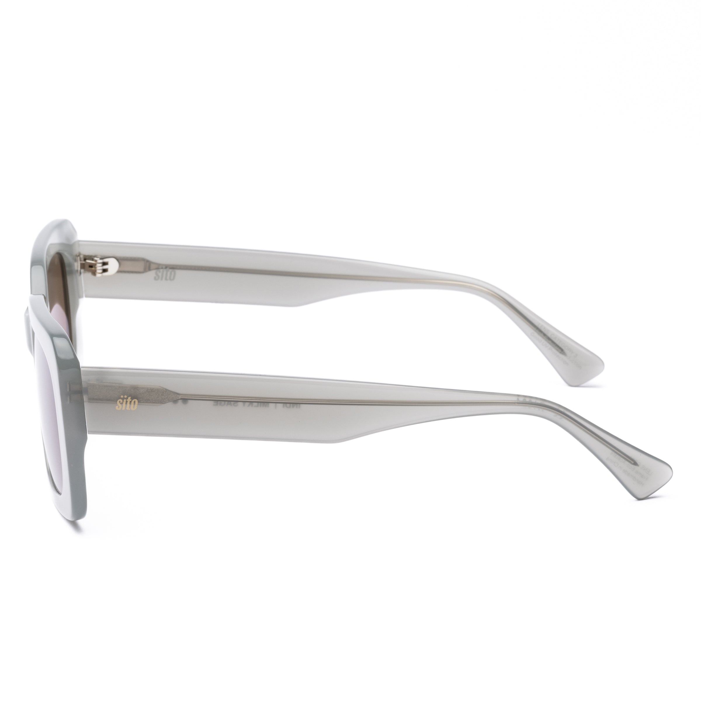 White sunglasses with brown lenses on a white background