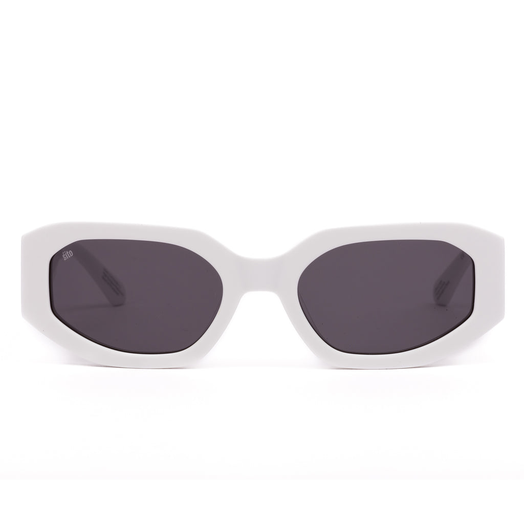 White sunglasses with dark lenses on a white background