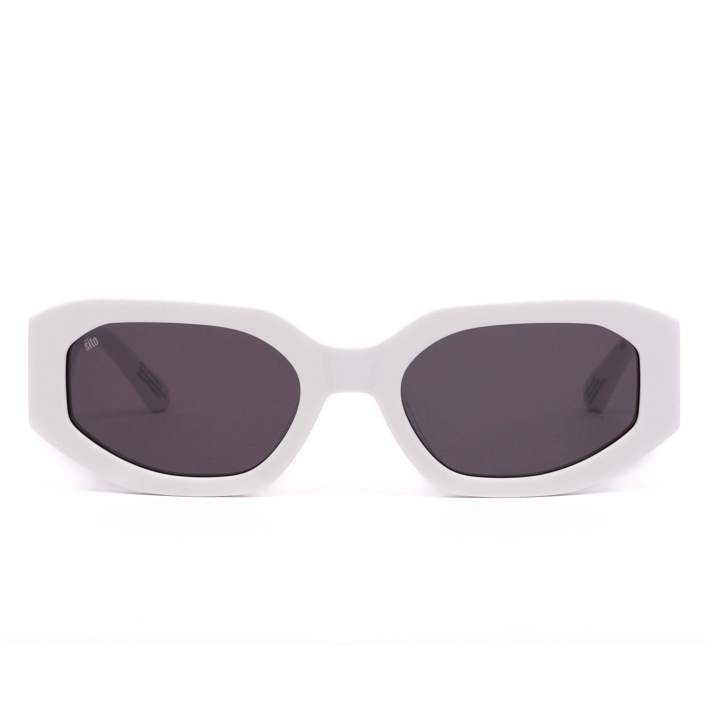 White sunglasses with dark lenses on a white background