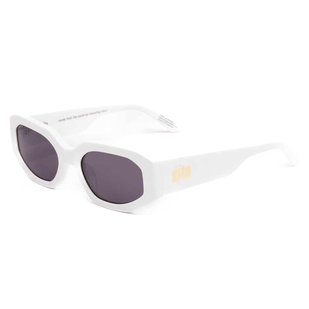 White sunglasses with dark lenses on a white background