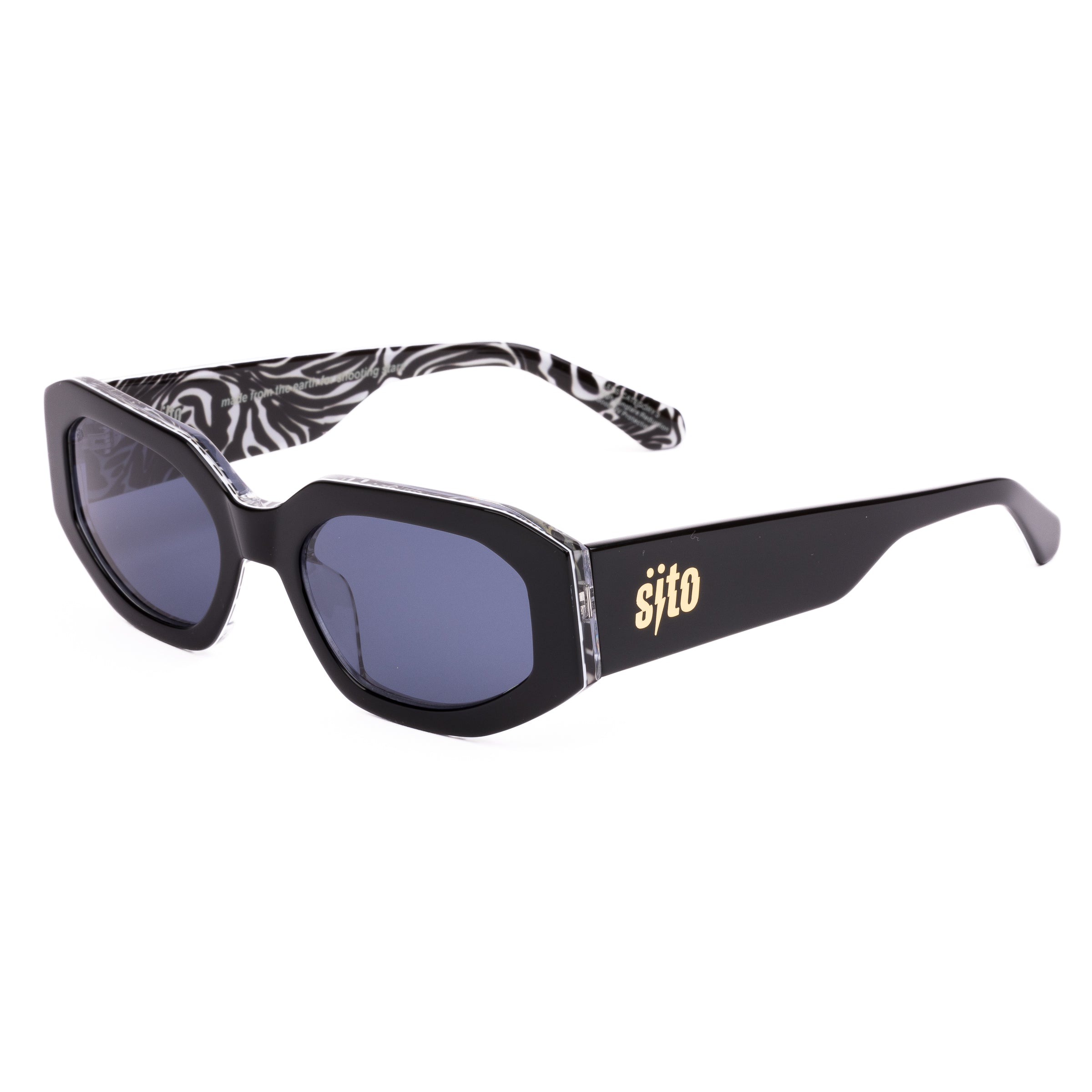 Sunglasses with black and white patterned arms and 'sifto' branding on a white background