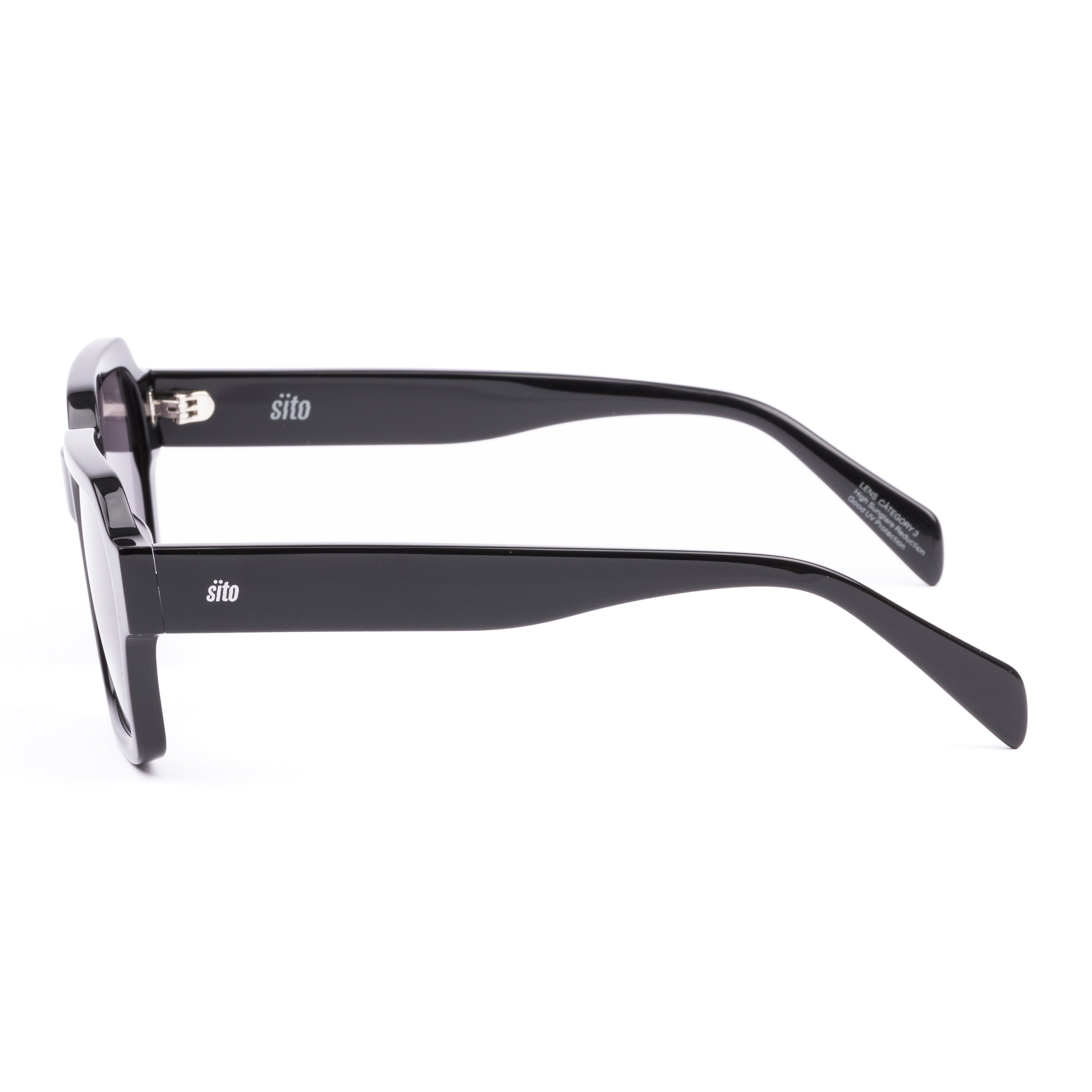 Black sunglasses with a glossy black finish and softly tinted lenses.