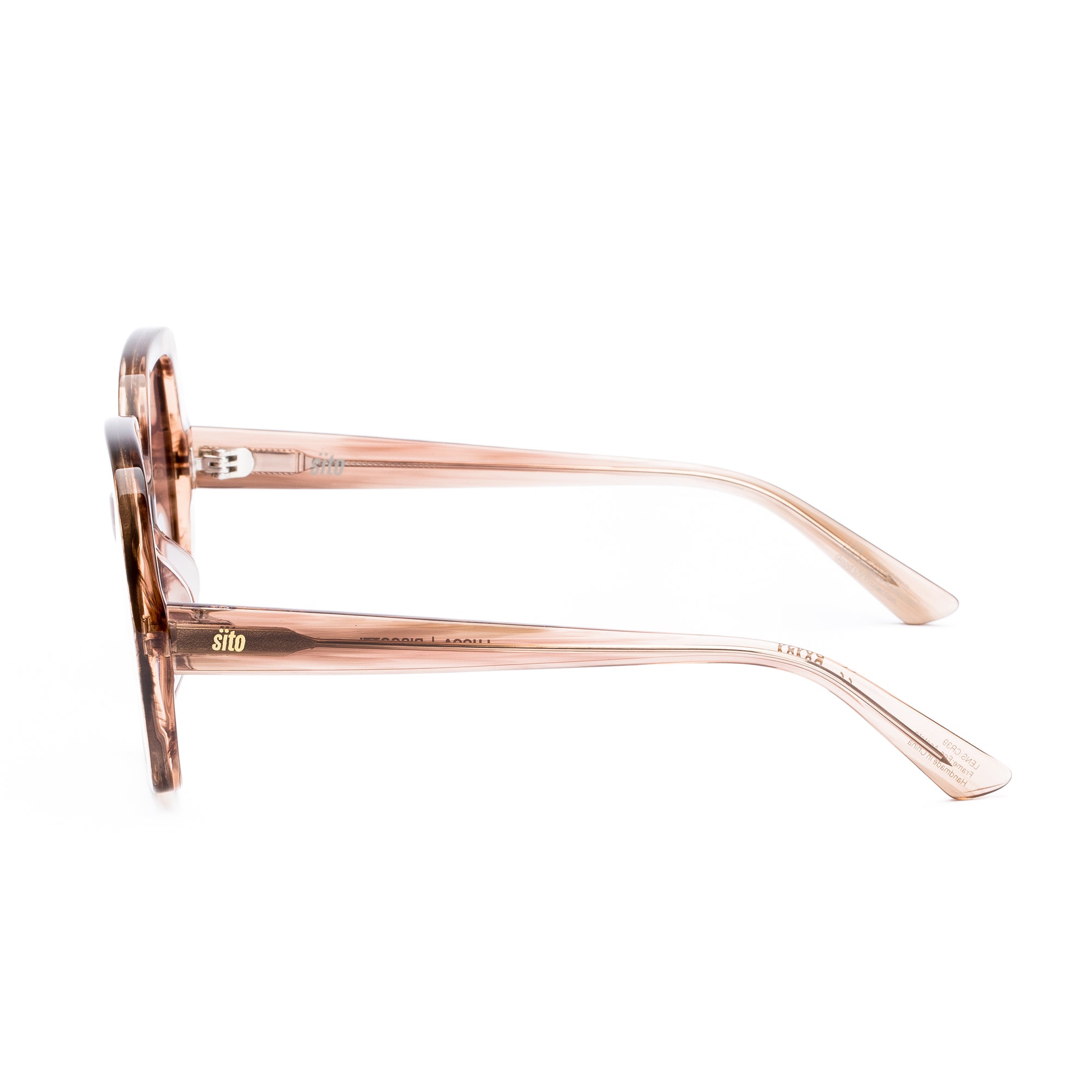 Sunglasses with rose gold frame and gradient lenses on a white background