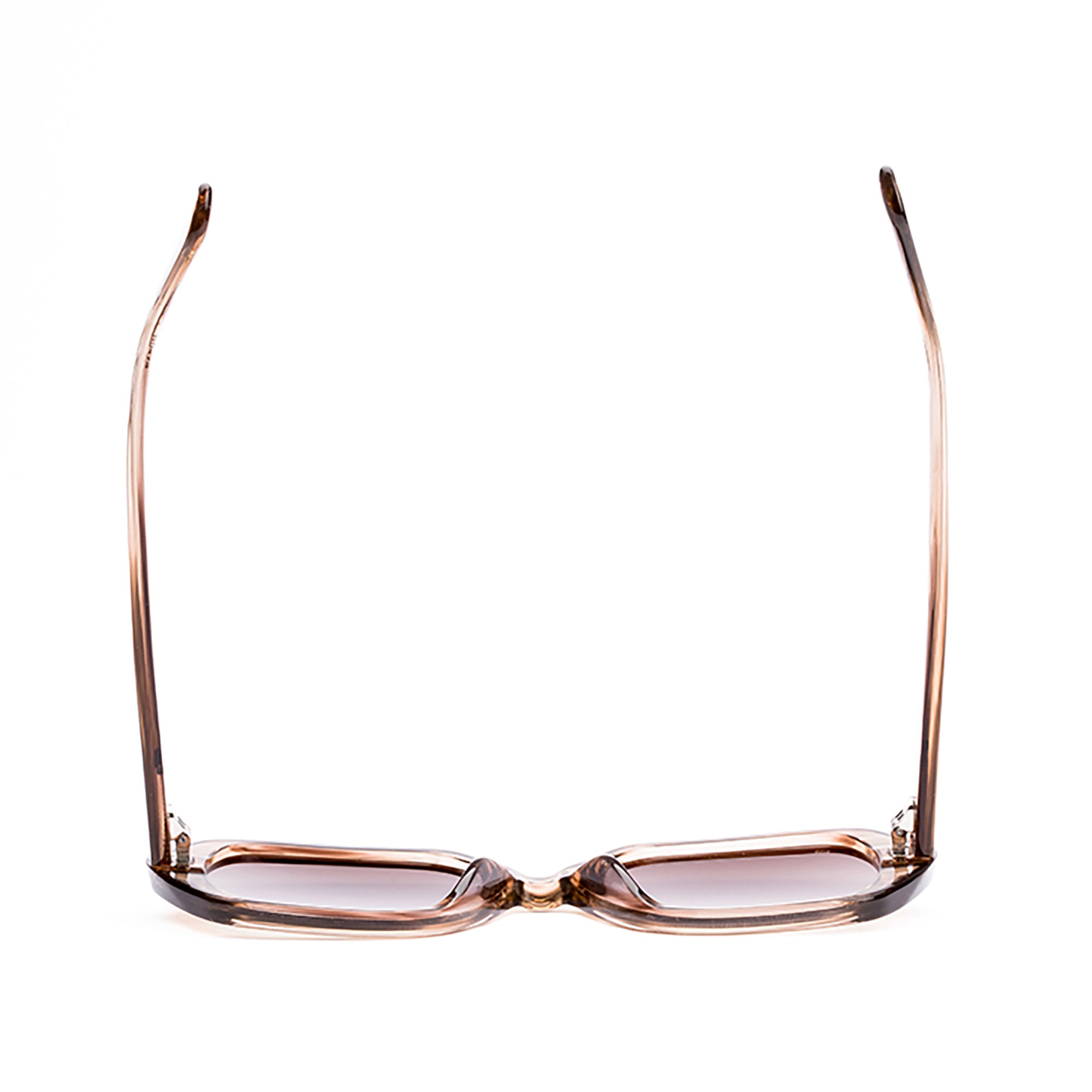 Sunglasses with rose gold frame and gradient lenses on a white background