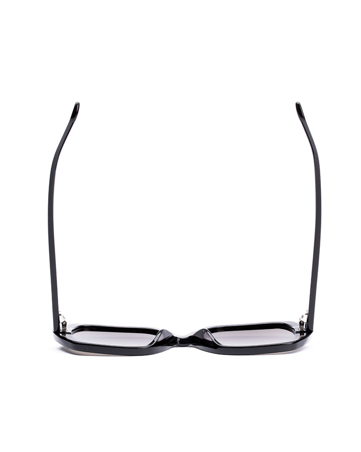 Black sunglasses with reflective lenses on a white background