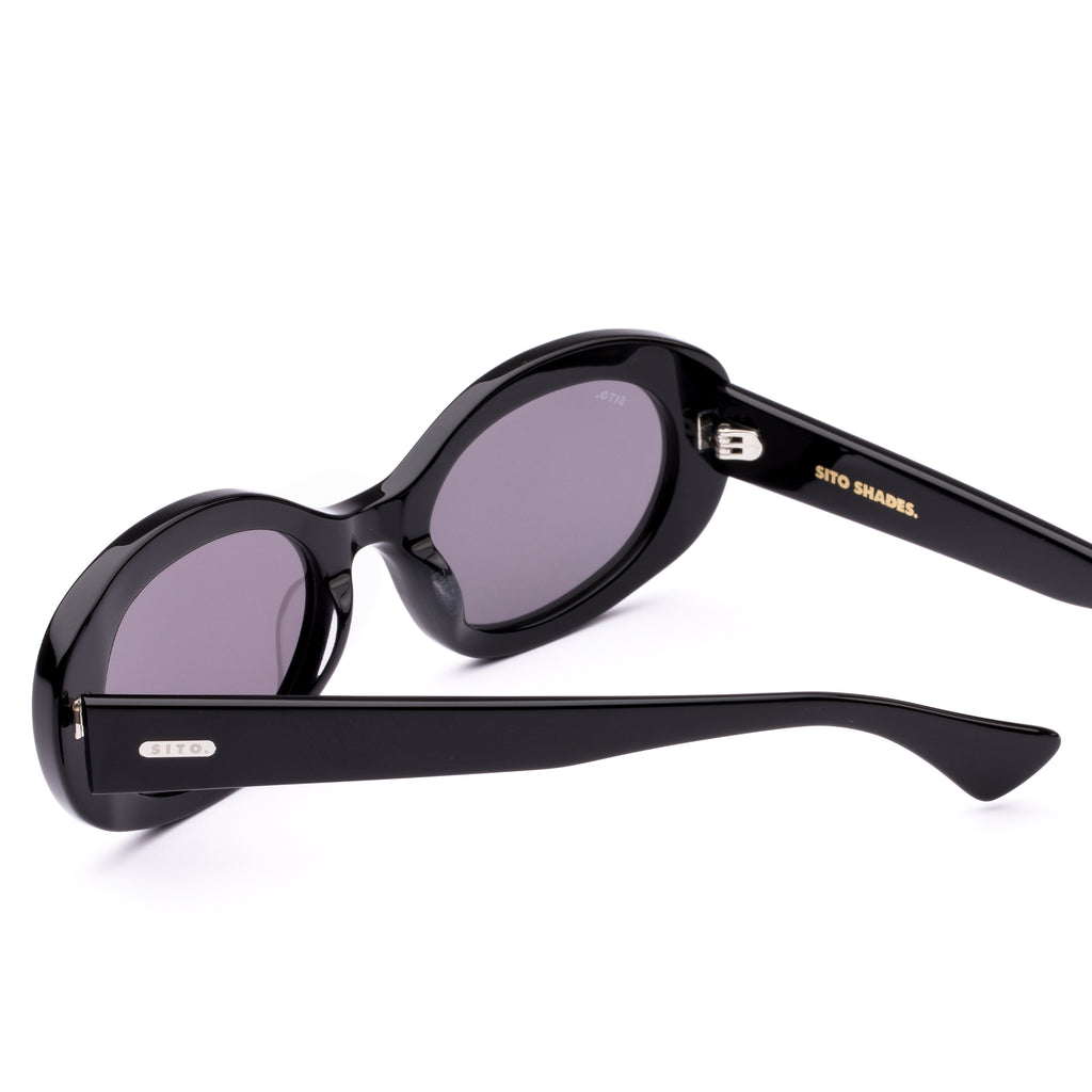 Black oval sunglasses on a white background