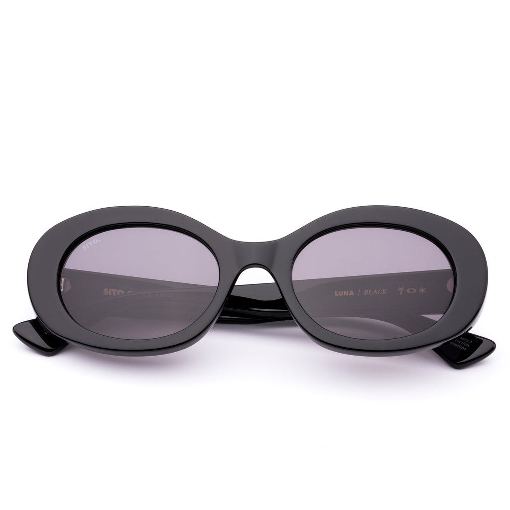 Black oval sunglasses on a white background
