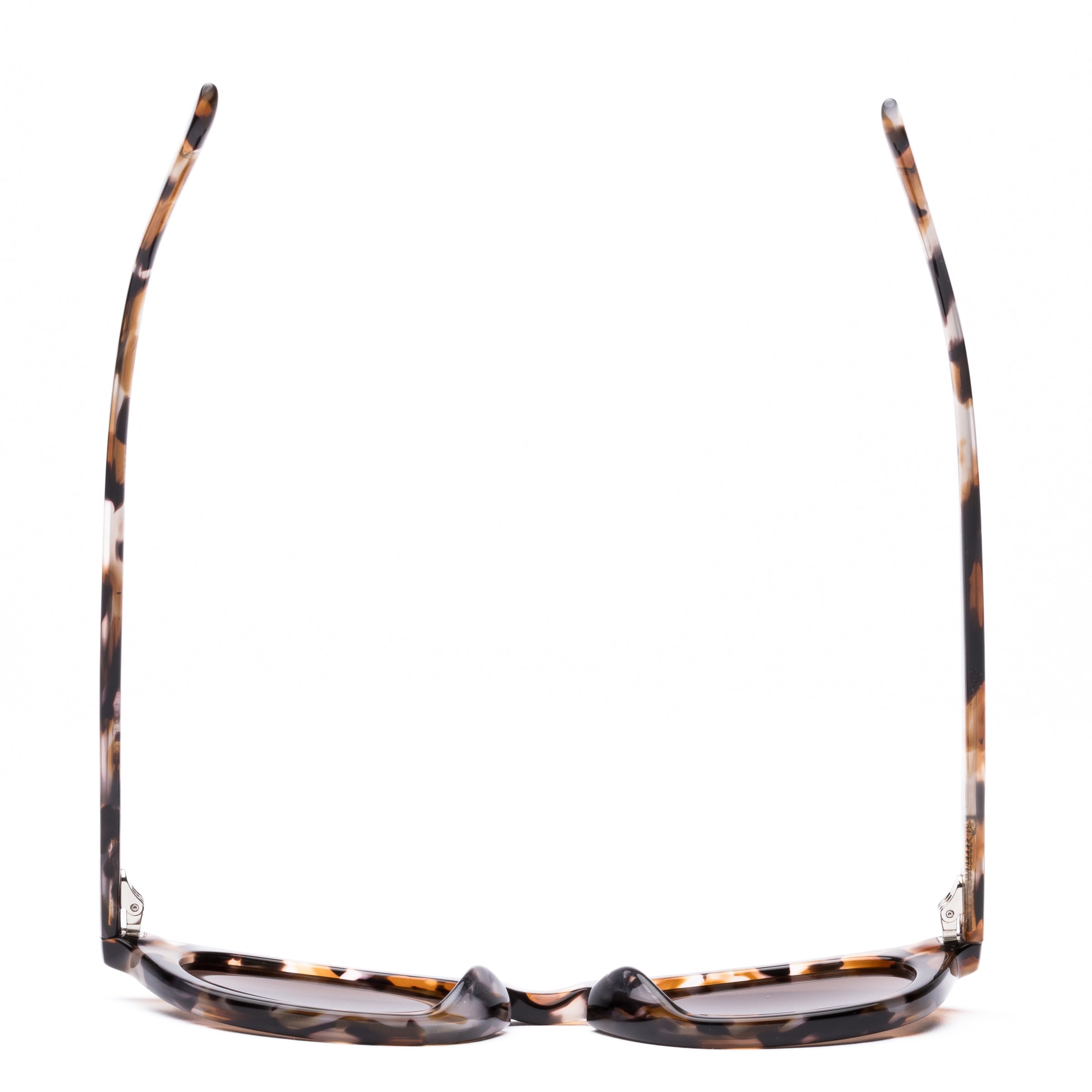 Sunglasses with tortoiseshell frame and brown lenses on a white background