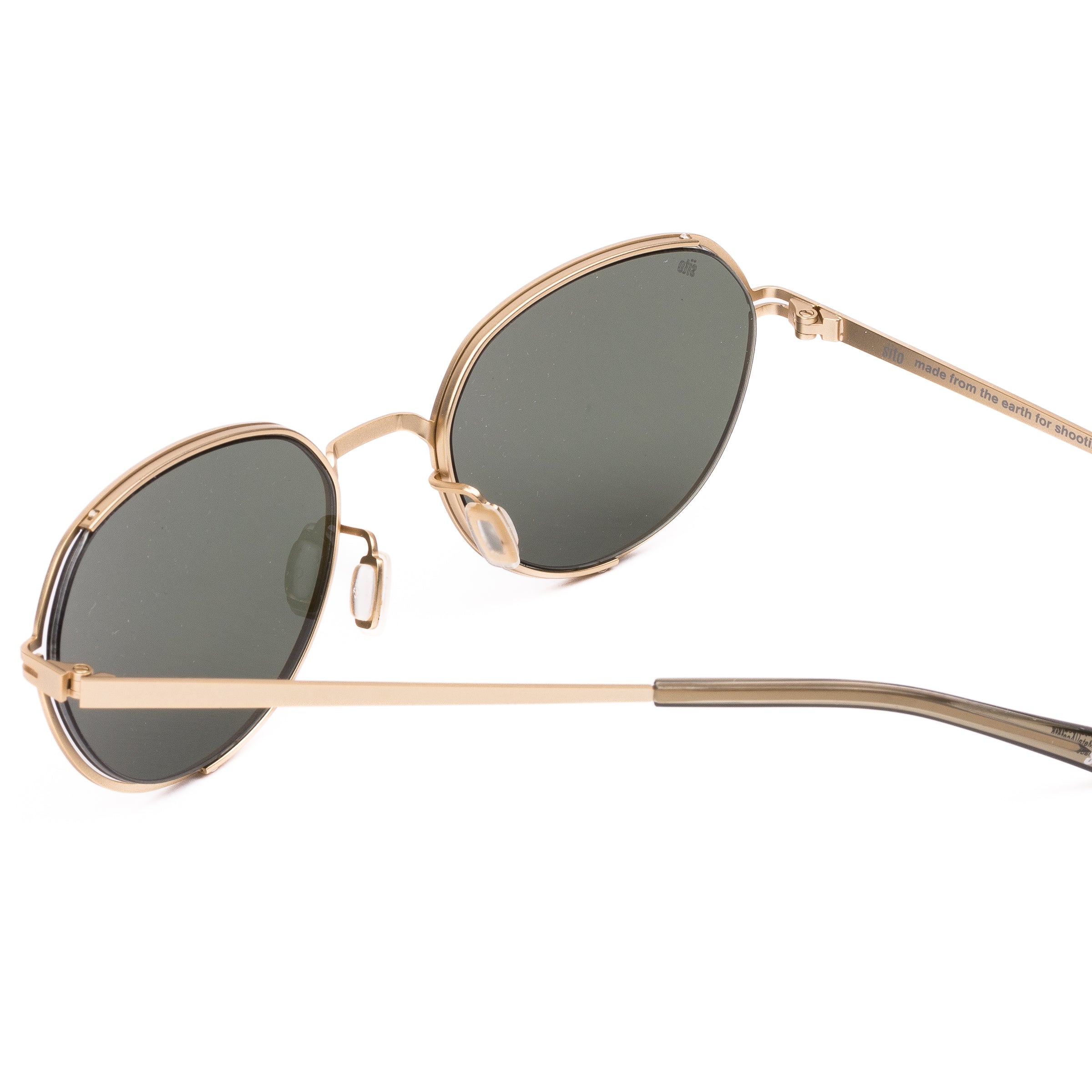 Gold-framed sunglasses with dark lenses on a white background