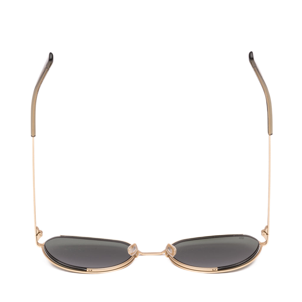 Gold-framed sunglasses with dark lenses on a white background