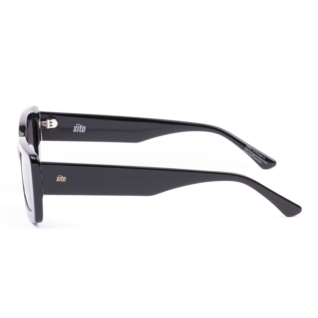 Black sunglasses with gray lenses on a white background