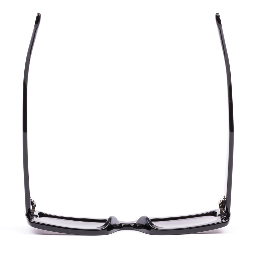 Black sunglasses with gray lenses on a white background
