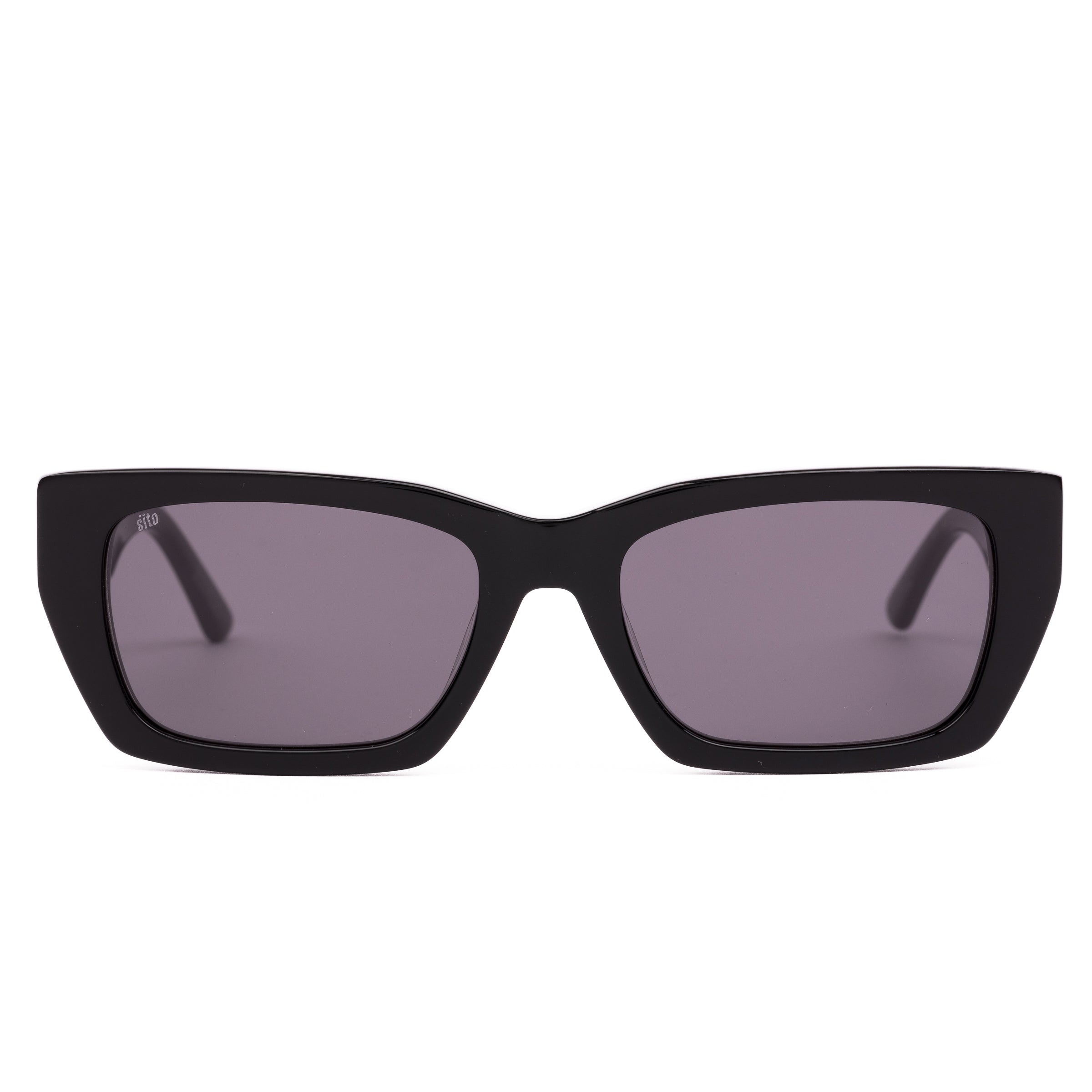 Black sunglasses with dark lenses on a white background