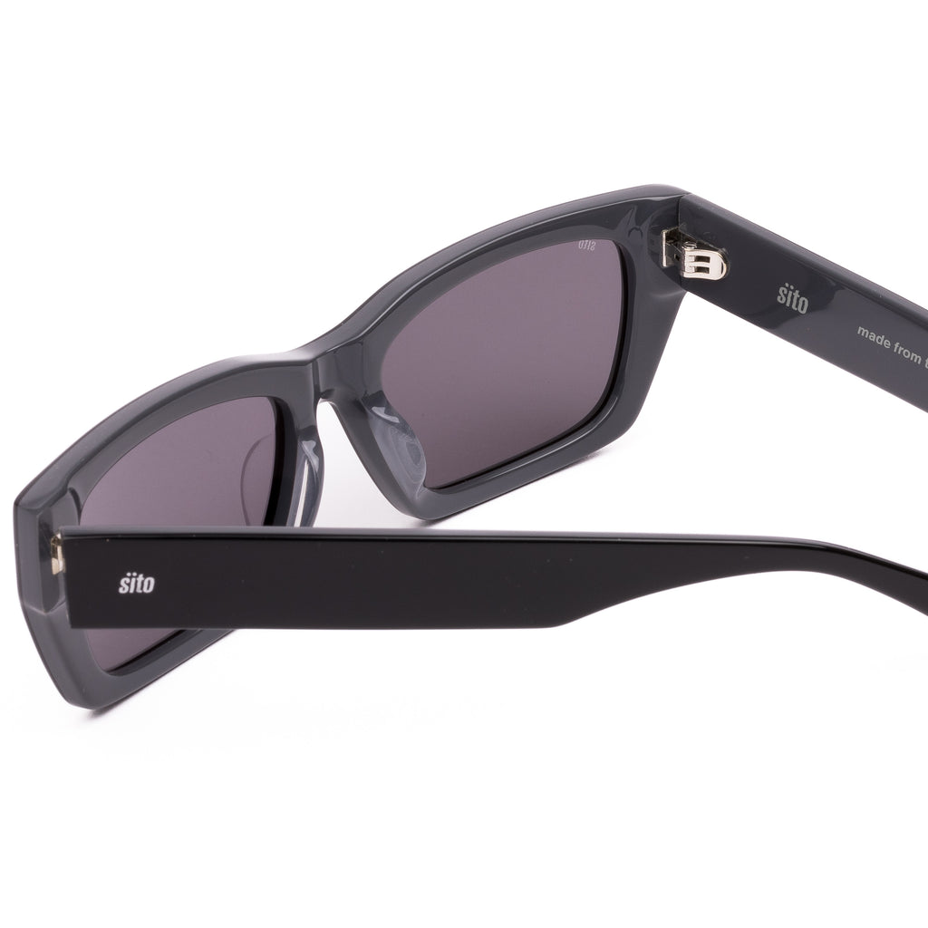 Black sunglasses with 'sito' branding on a white background