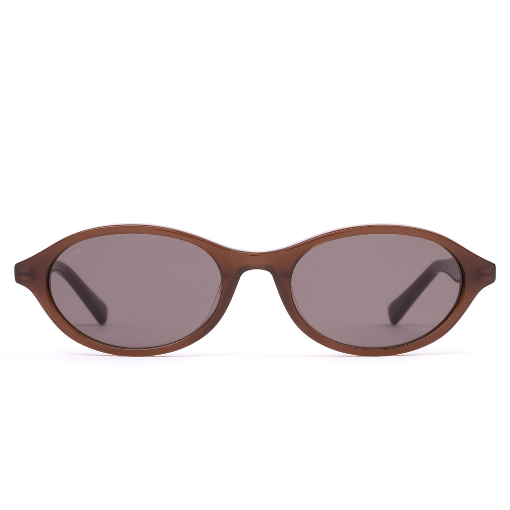 Brown sunglasses with a reflective lens on a white background