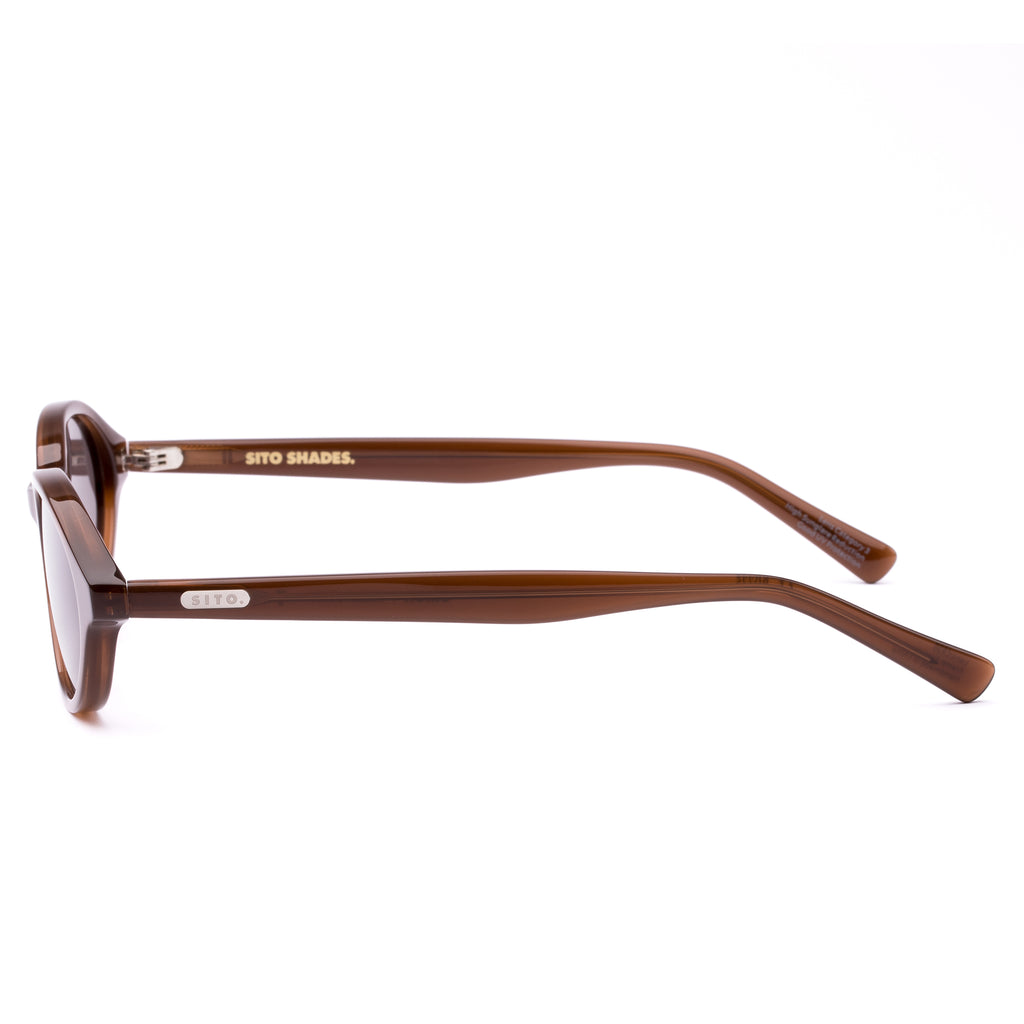 Brown sunglasses with a reflective lens on a white background