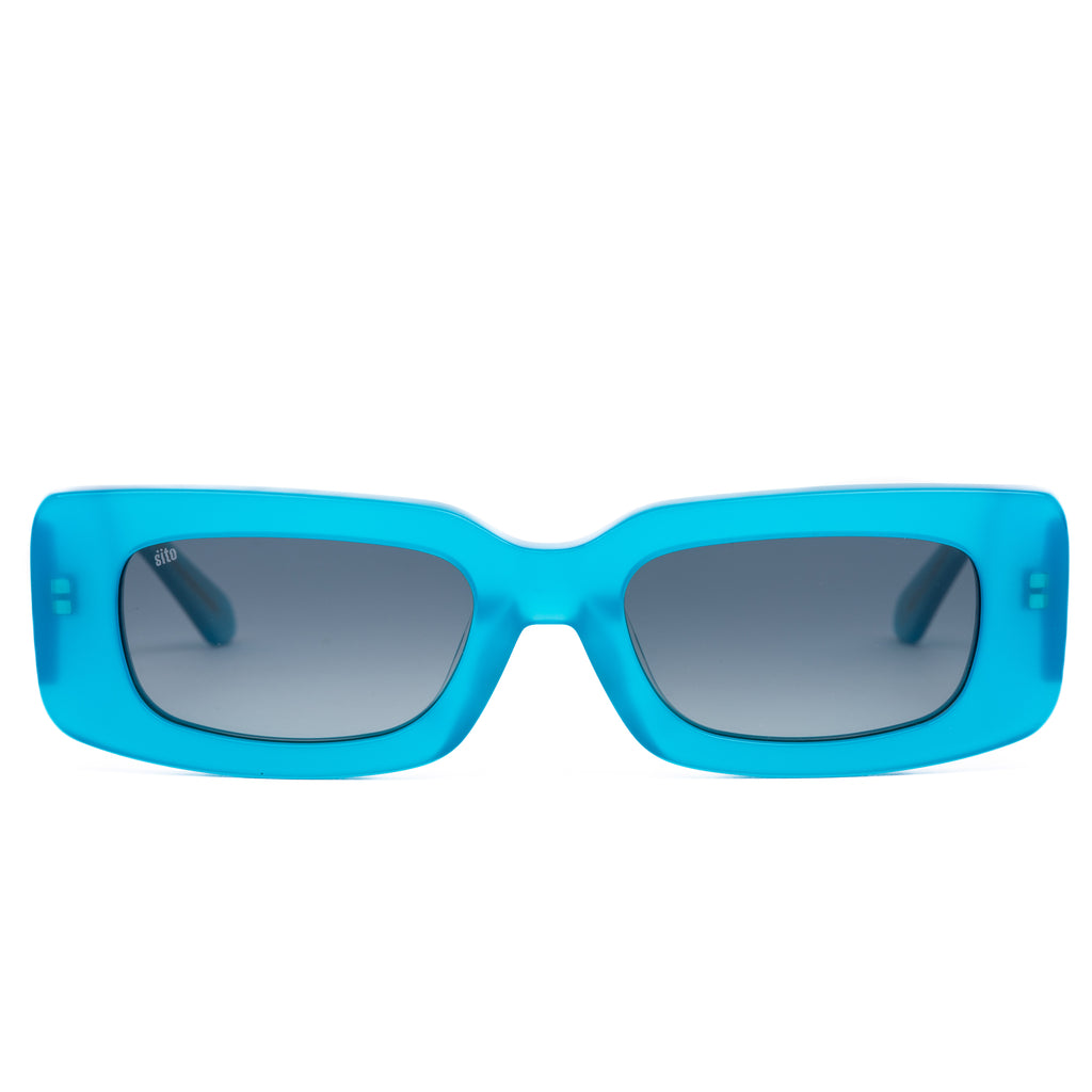 Blue sunglasses with a white background