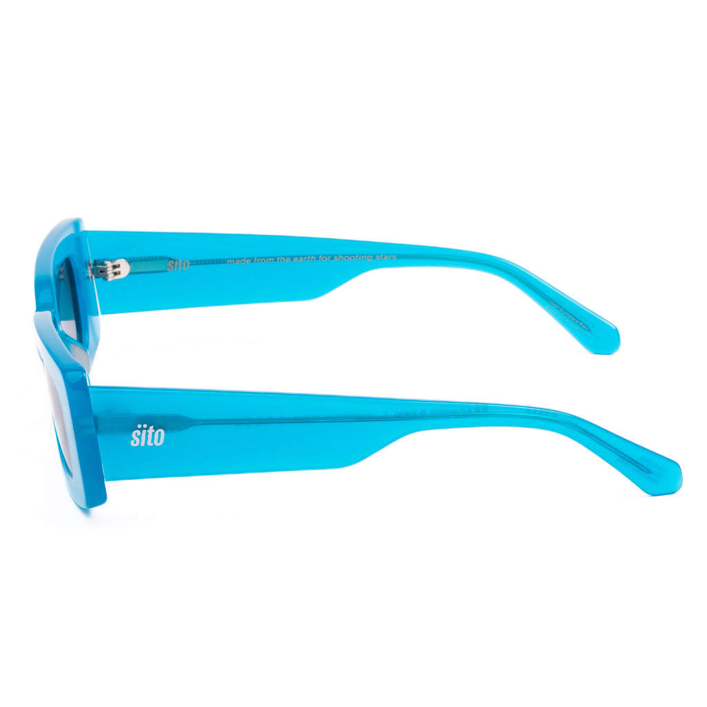 Blue sunglasses with a white background