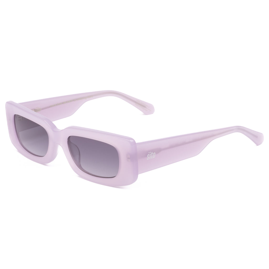 Pink sunglasses with dark lenses on a white background