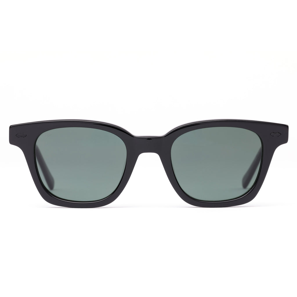 Black sunglasses with dark lenses on a white background