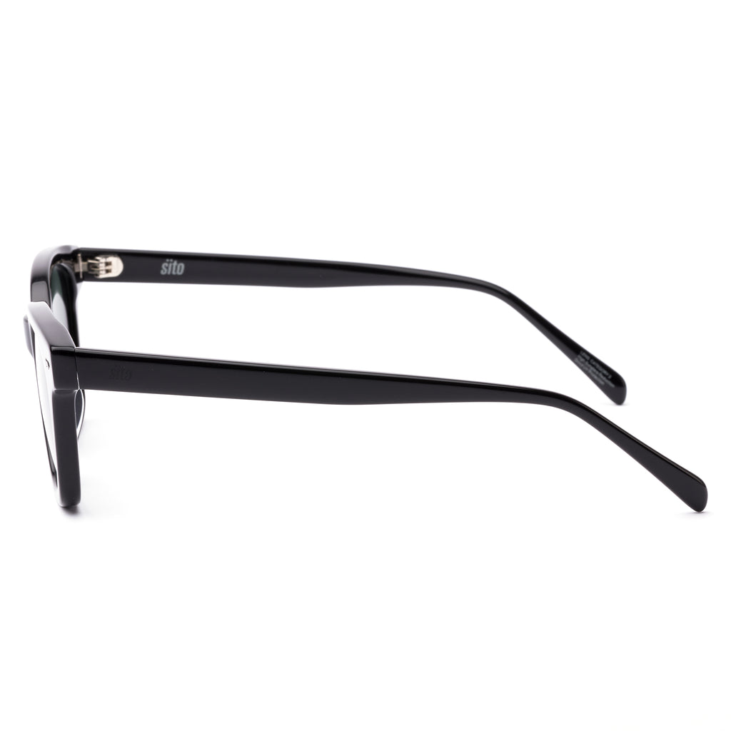 Black sunglasses with dark lenses on a white background