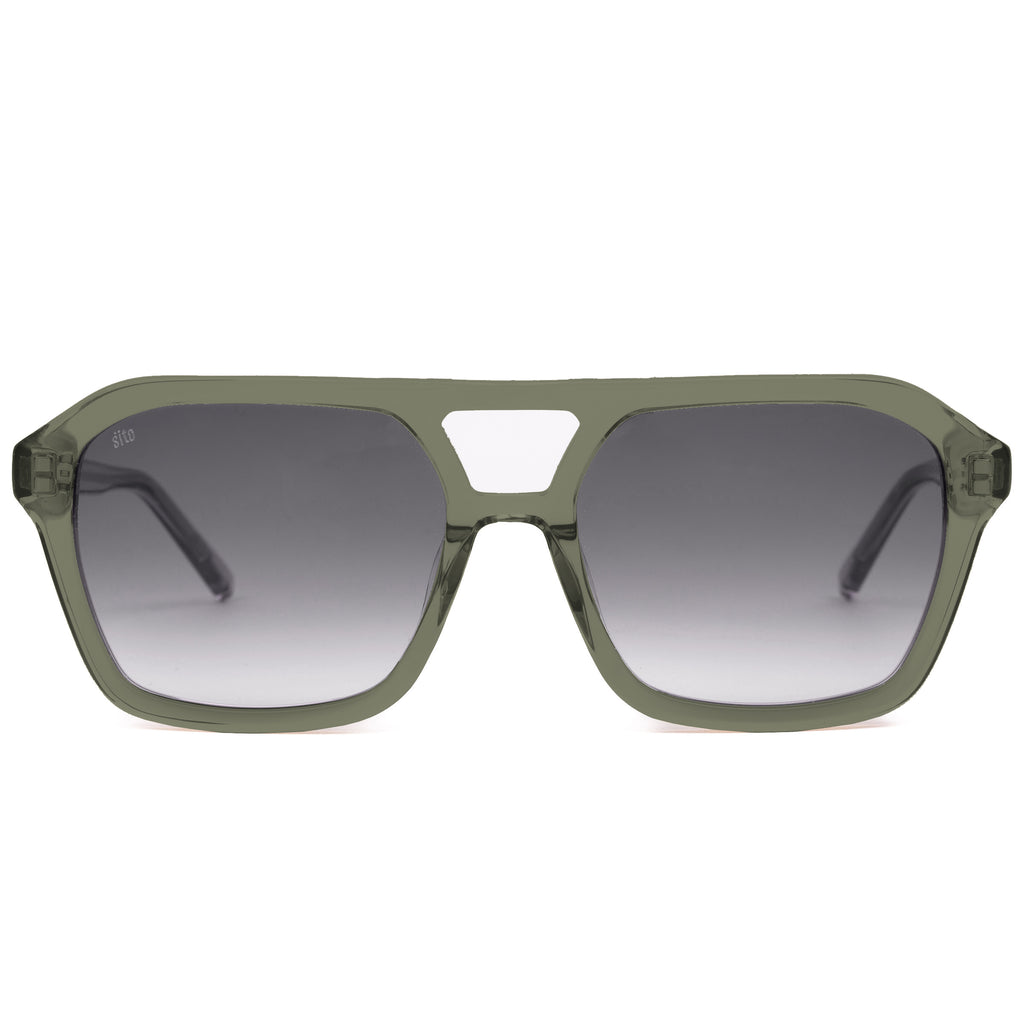 Green sunglasses with a gradient lens on a white background