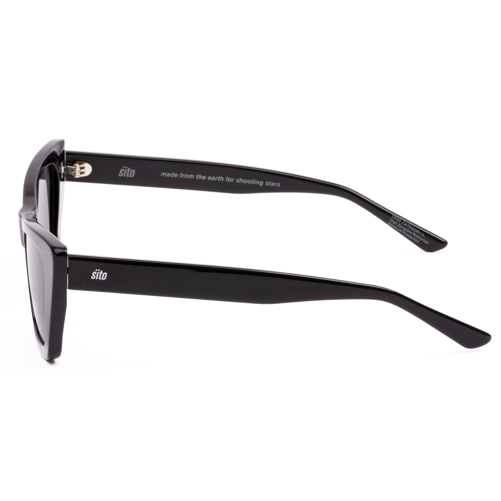Black cat-eye sunglasses with dark lenses on a white background