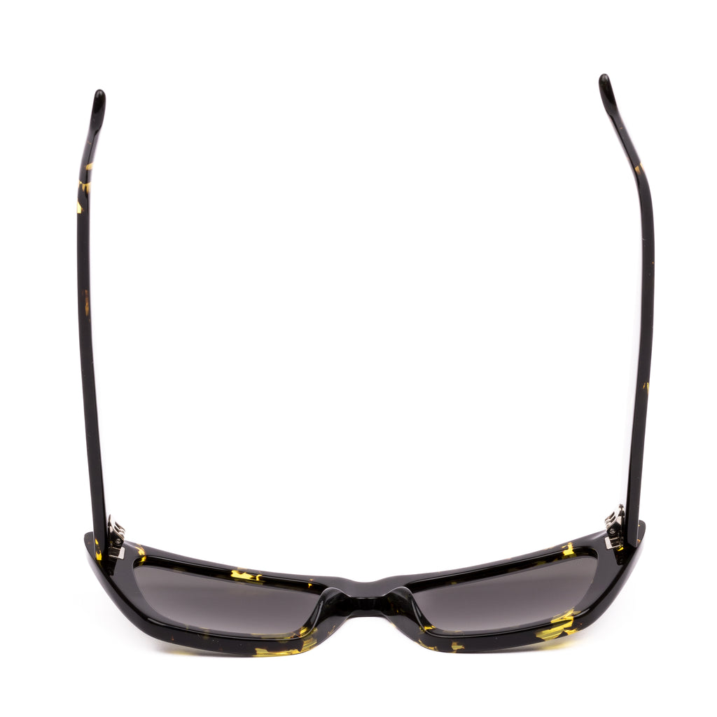 Cat-eye sunglasses with black frame and yellow accents on a white background