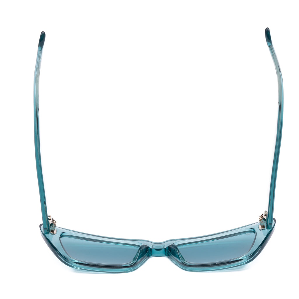 Aqua blue sunglasses with a clear frame on a white background