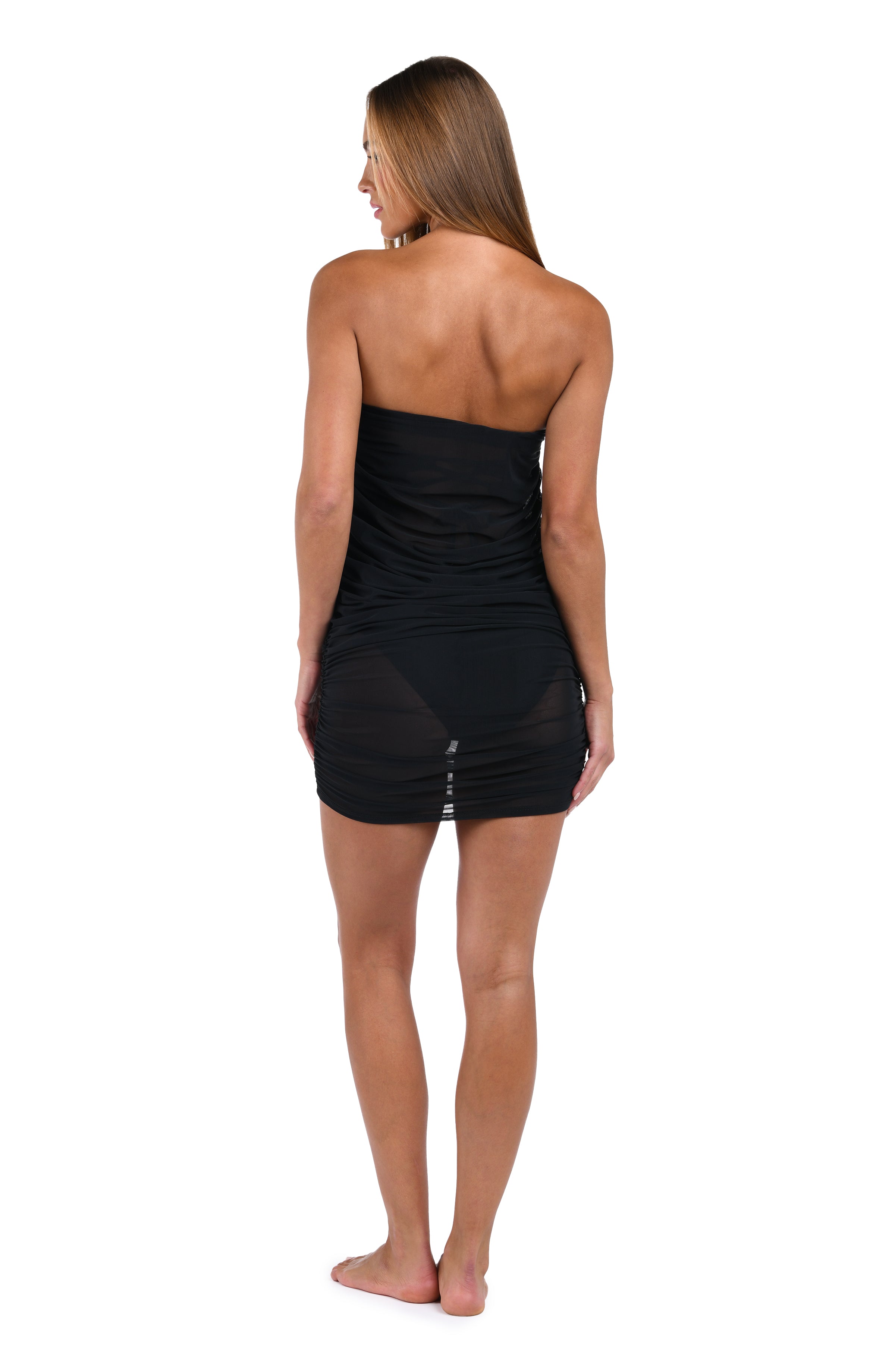 Woman wearing a black black sarong on a white background