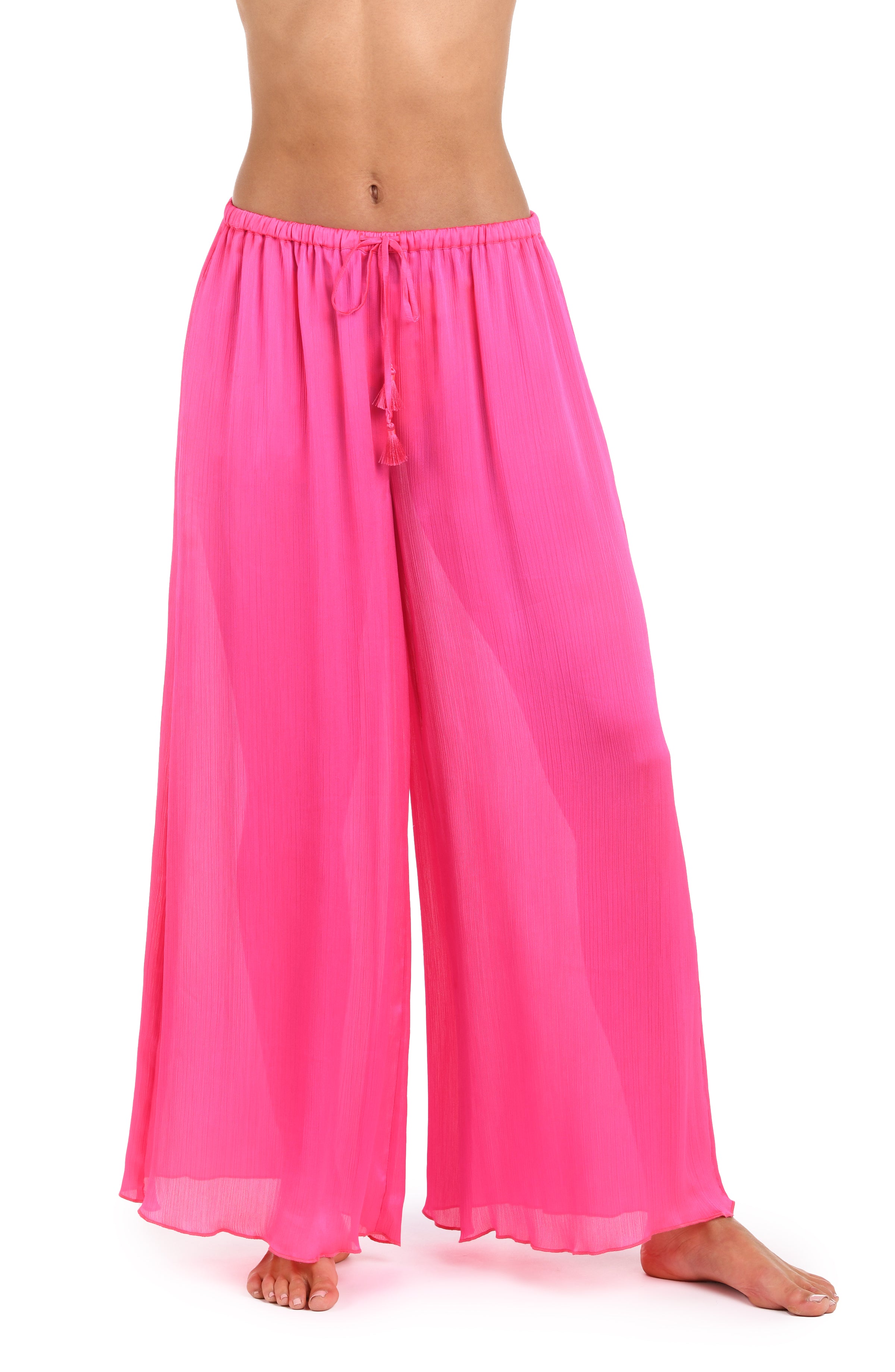 Bright pink wide-leg pants on a white background