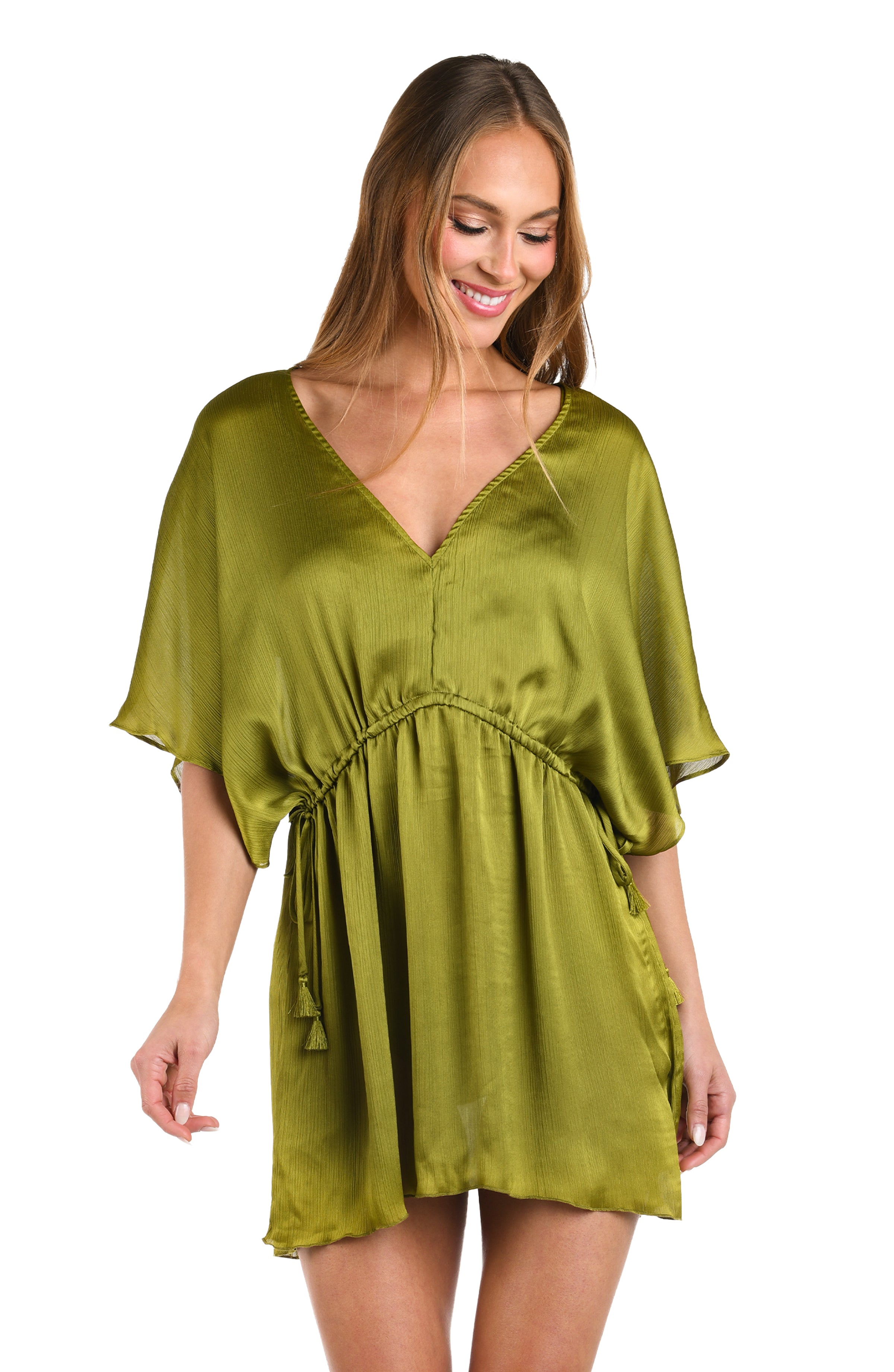 Woman wearing a solid olive v-neck tunic cover up.