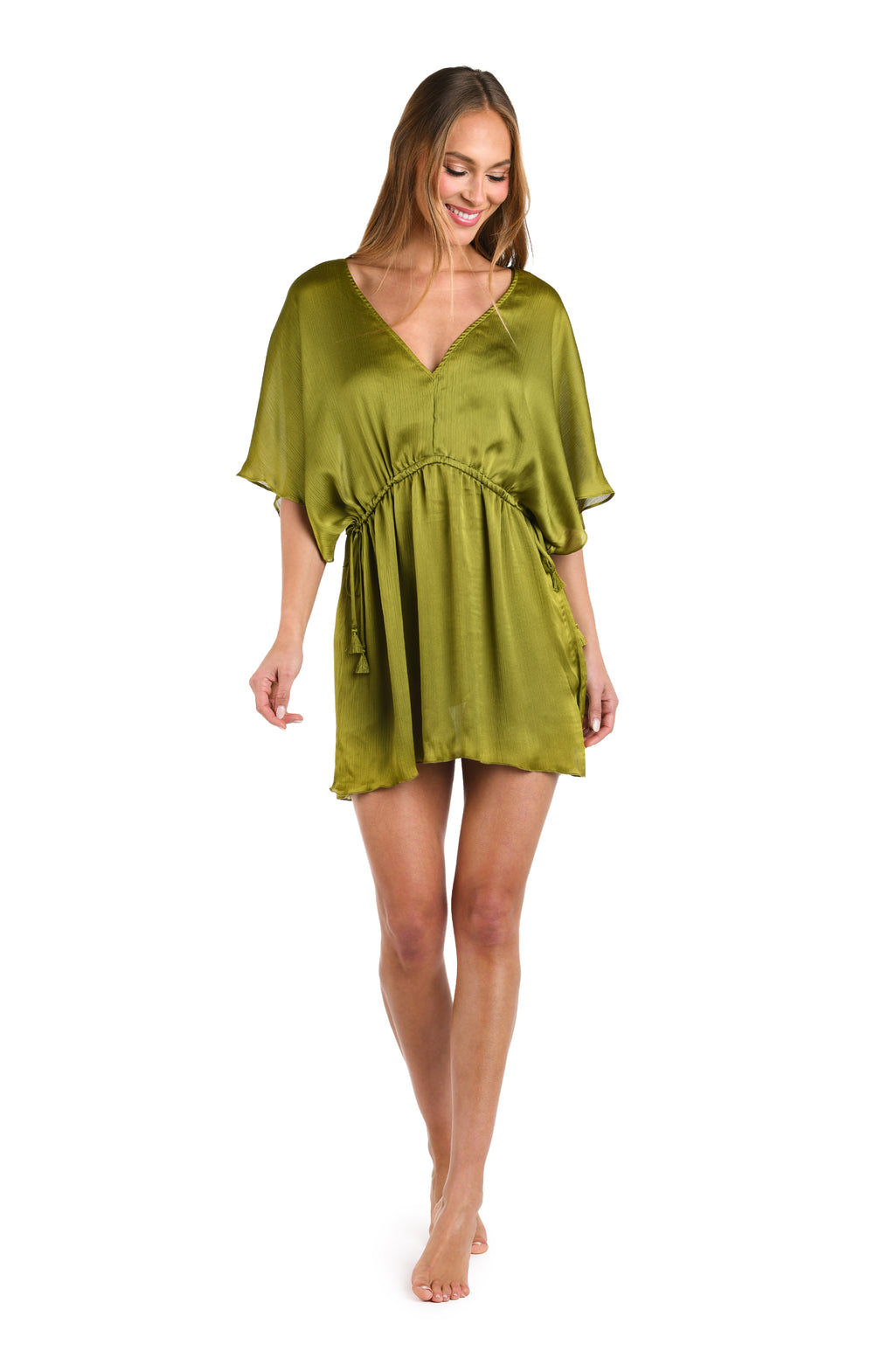 Woman wearing a solid olive v-neck tunic cover up.