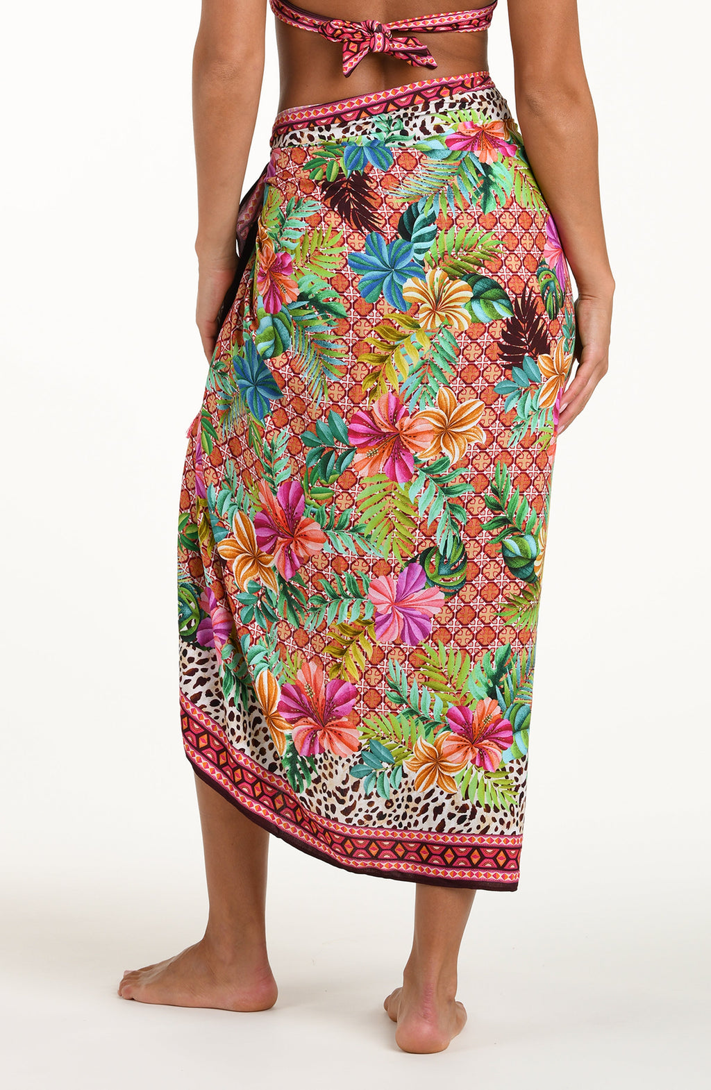 Colorful tropical patterned skirt on a white background