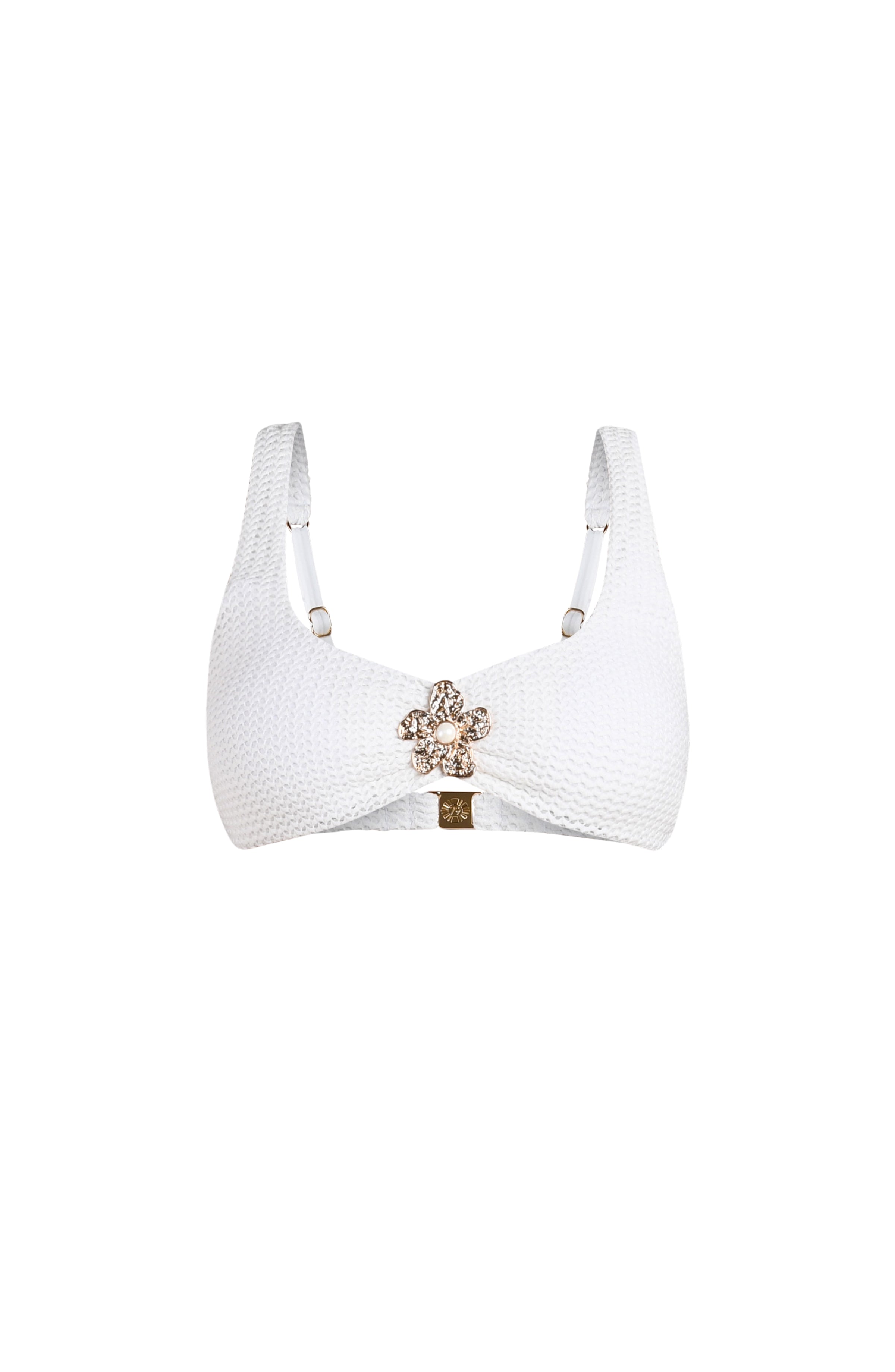 White bikini top with a decorative clasp on a white background