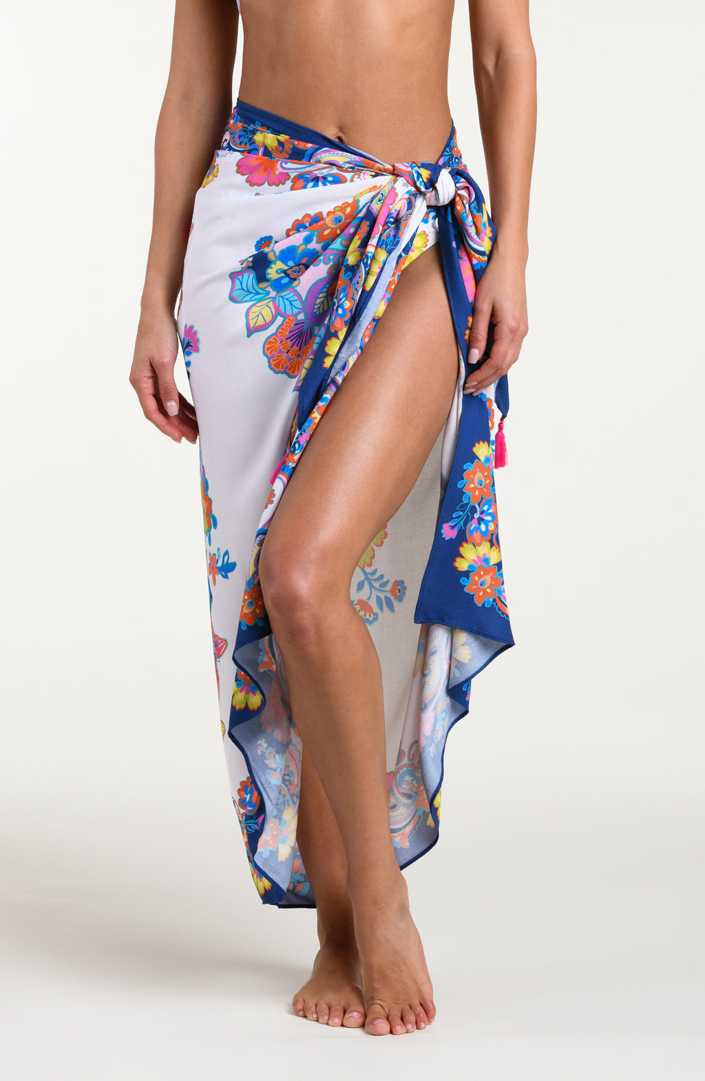 Multicolored sarong being worn by a person on a white background