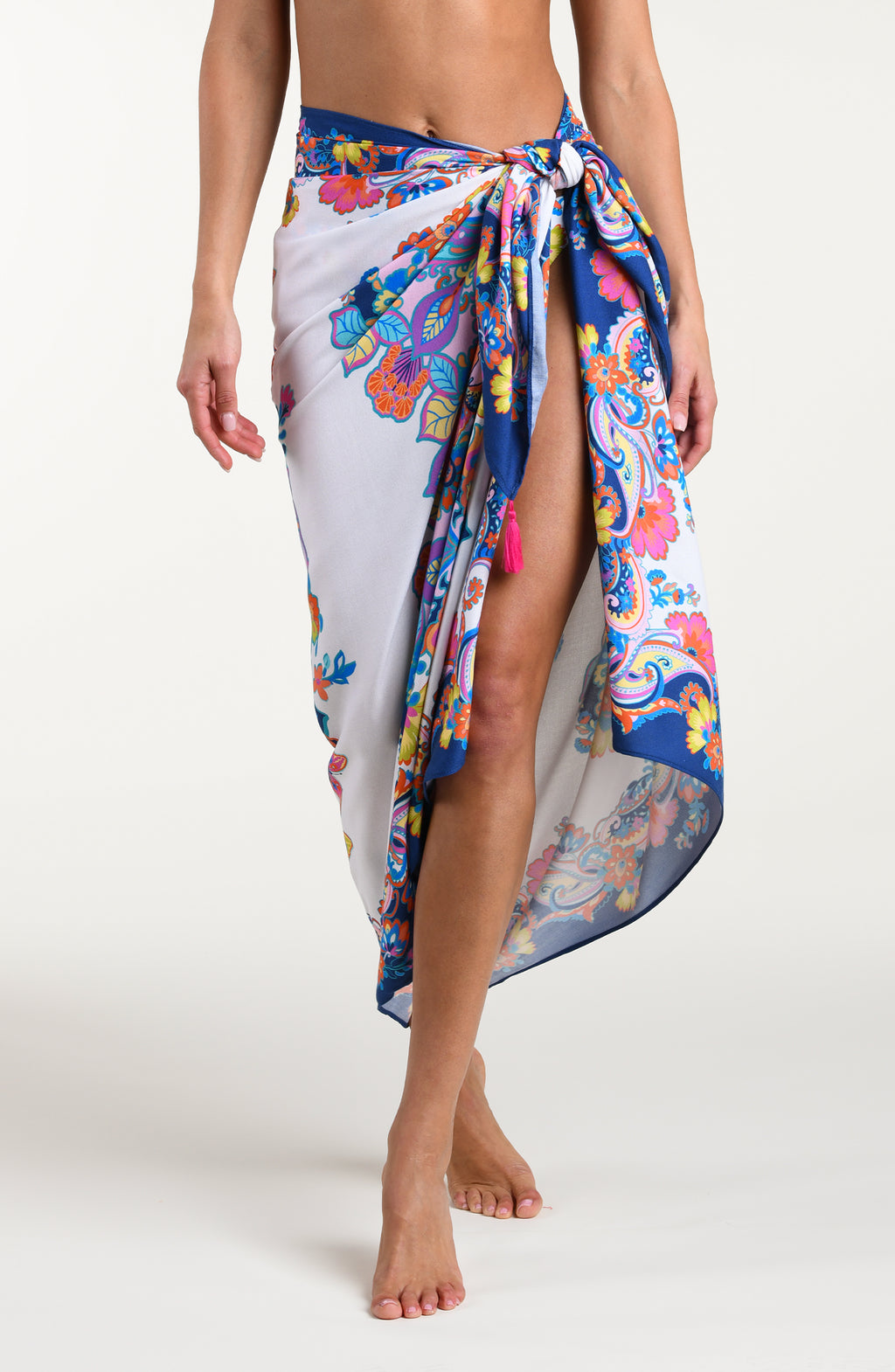 Multicolored sarong being worn by a person on a white background