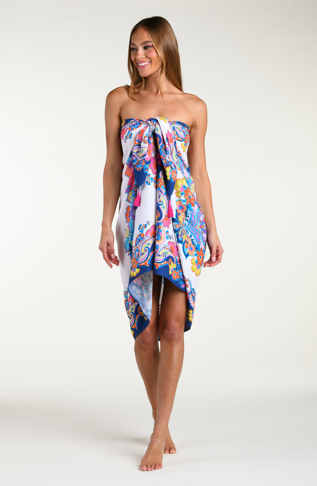 Multicolored sarong being worn by a person on a white background