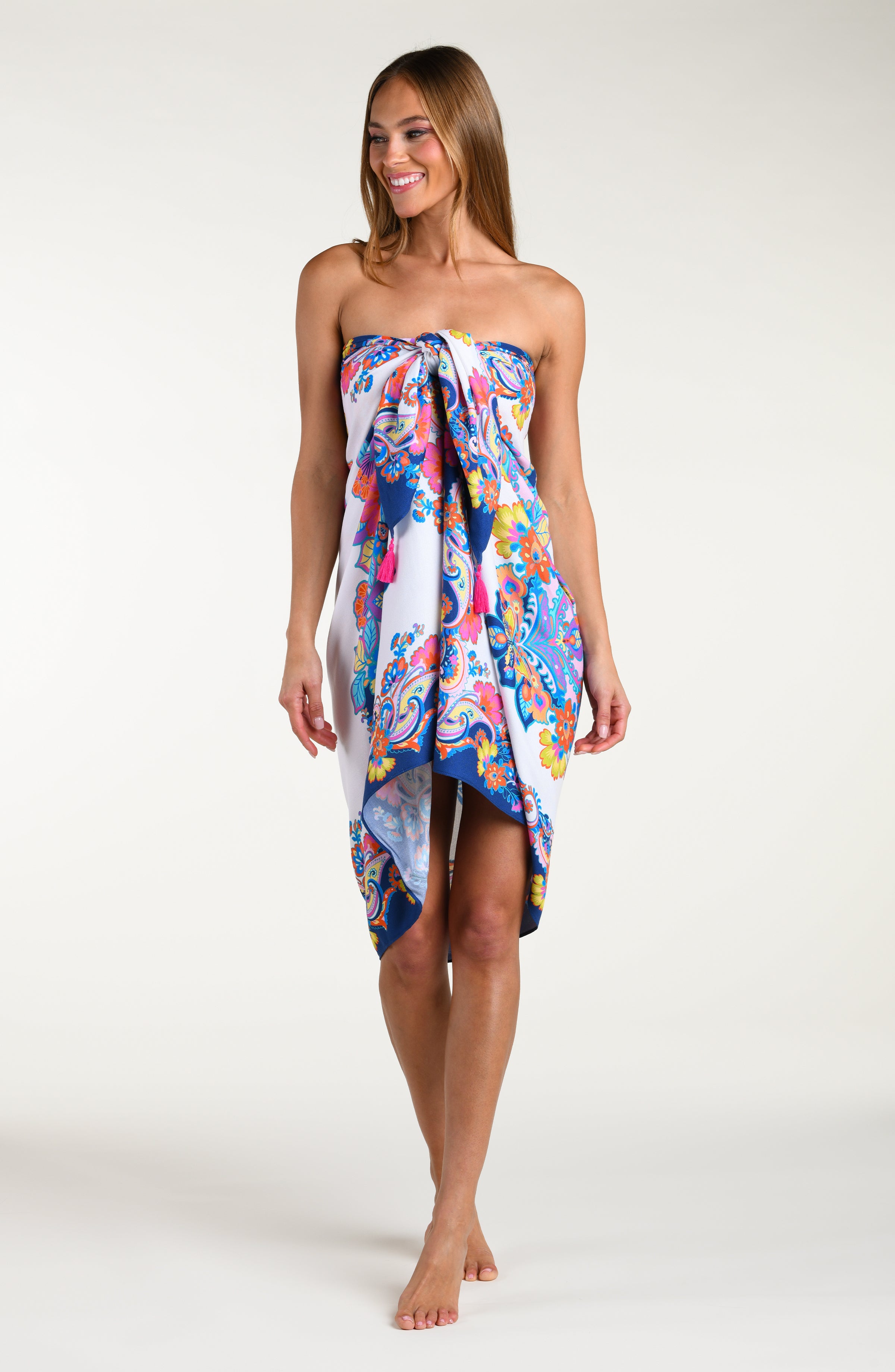 Multicolored sarong being worn by a person on a white background