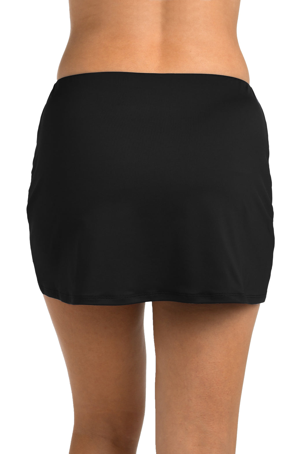 Black swim skirt worn by a person on a white background