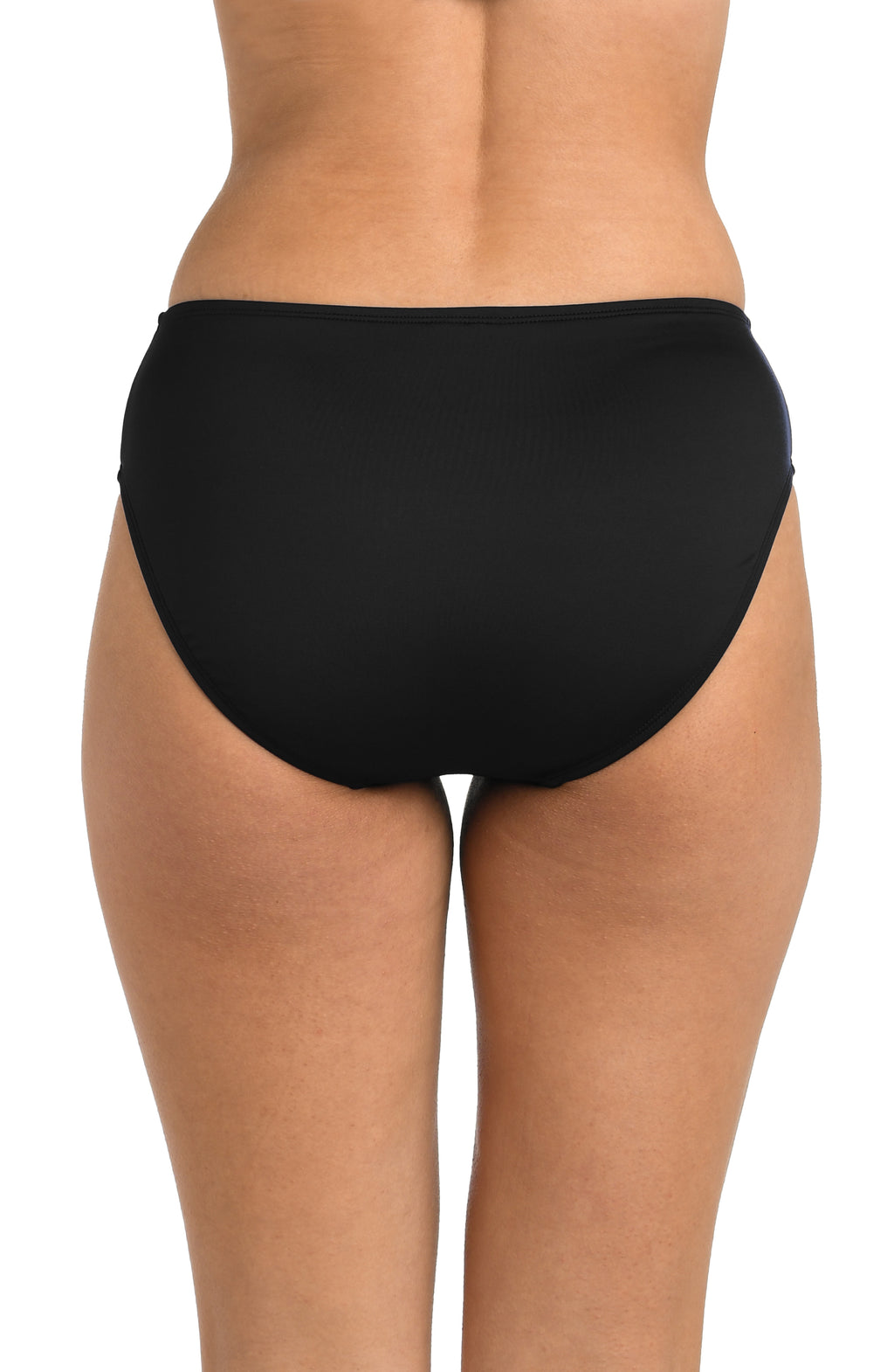 Black bikini bottom worn by a person on a white background