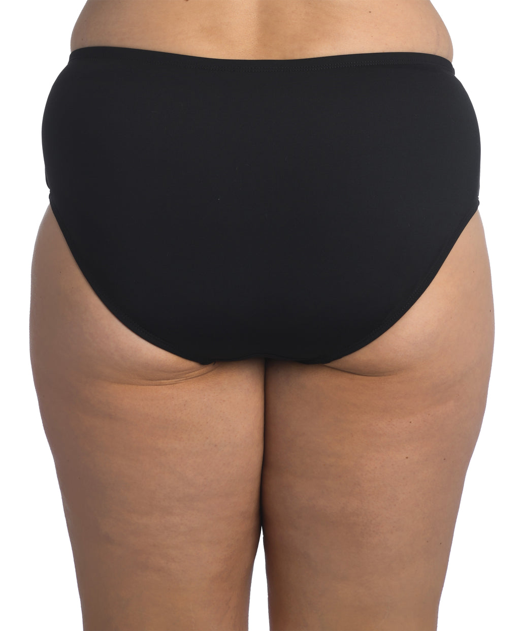 Black bikini bottom worn by a person on a white background
