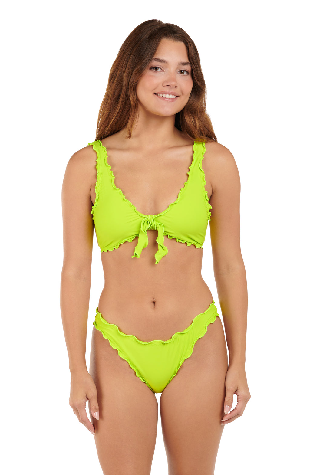 Woman wearing a bright lime bralette bikini top and matching bikini bottom against a white background. 