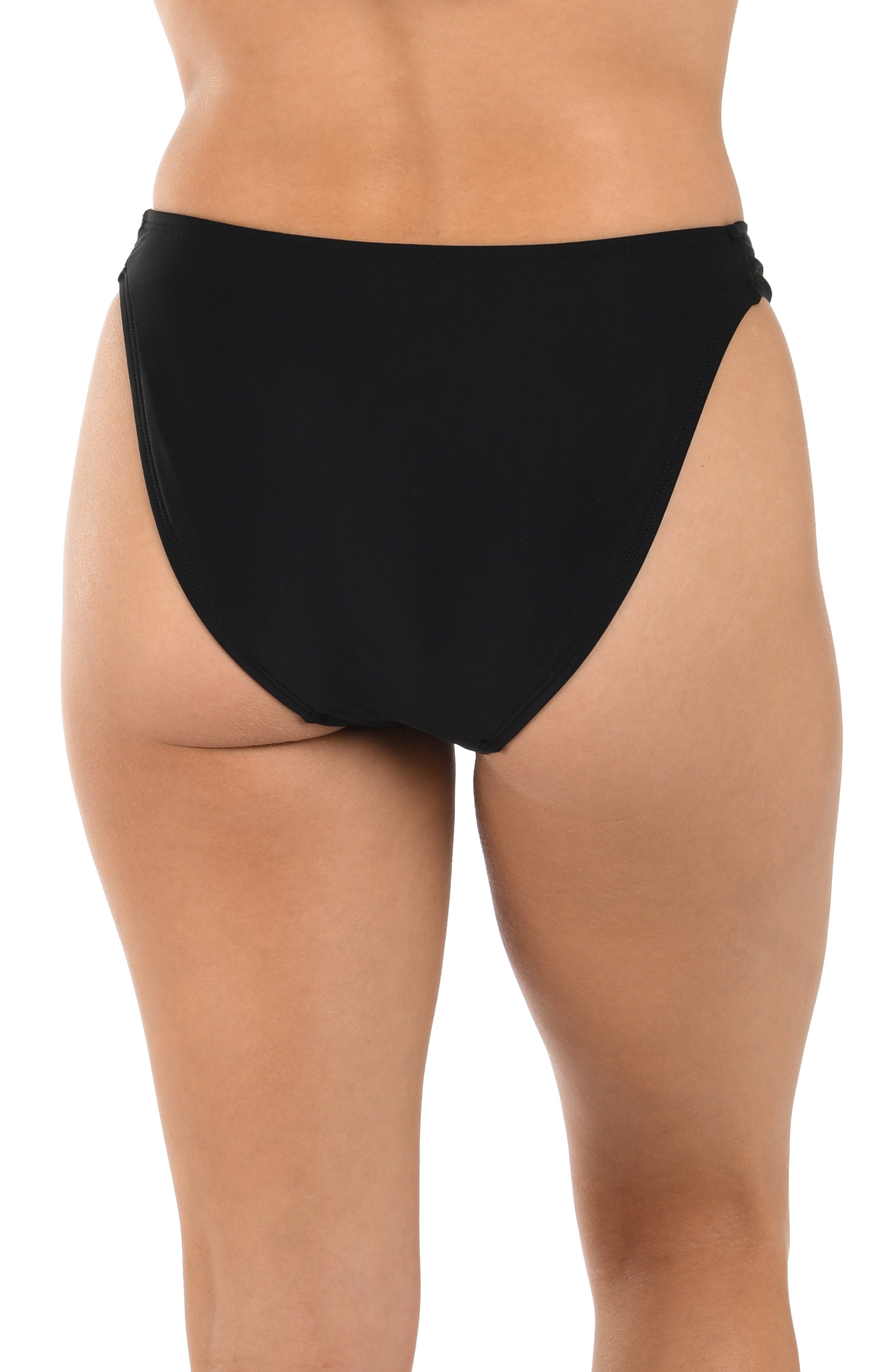 Black bikini bottom worn by a person on a white background