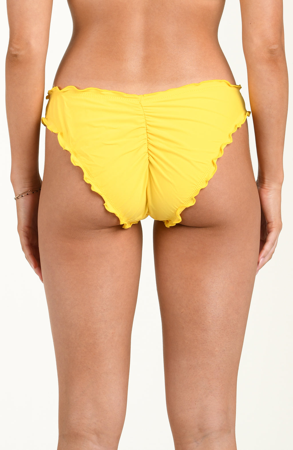 Yellow bikini bottom on a white background