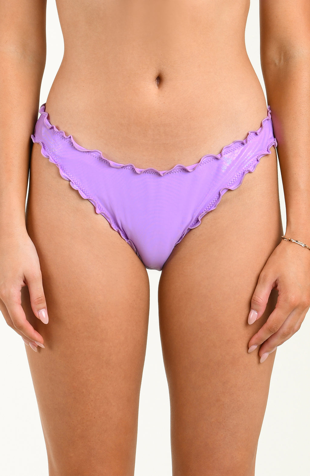 Purple bikini bottom on a plain background